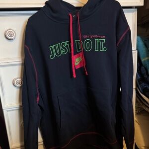 Nike Men's Dark Blue Hoodie with Green and Red Accents